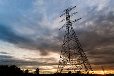 silhouette of high voltage electrical pole structureの写真素材