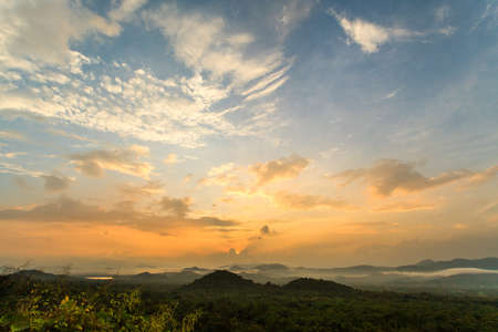 colorful dramatic sky with cloud at sunsetの写真素材