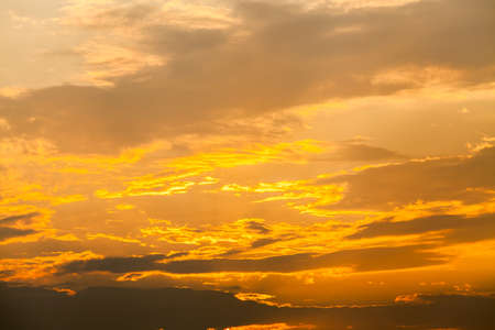 colorful dramatic sky with cloud at sunset