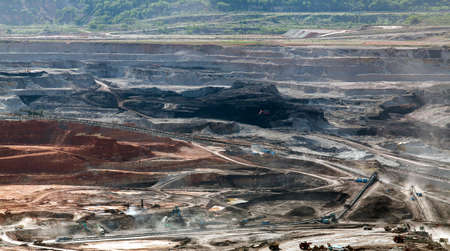 Part of a pit with big mining truck working