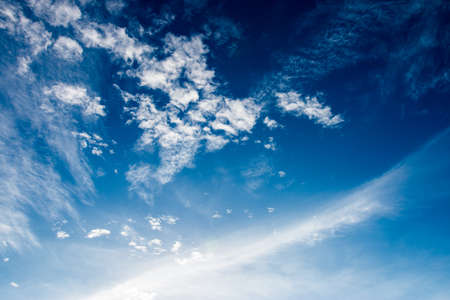 colorful dramatic sky with cloud at sunsetの写真素材