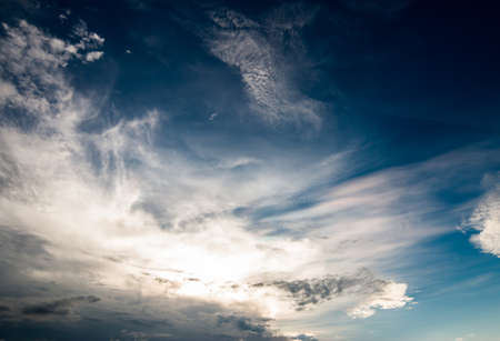 colorful dramatic sky with cloud at sunsetの写真素材