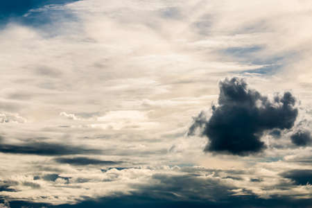 colorful dramatic sky with cloud at sunsetの写真素材