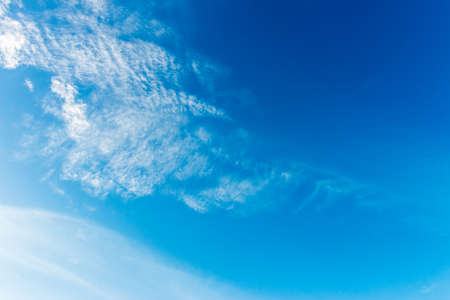 colorful dramatic sky with cloud at sunsetの写真素材