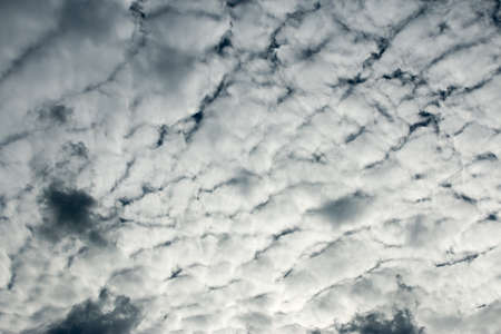 colorful dramatic sky with cloud at sunsetの写真素材