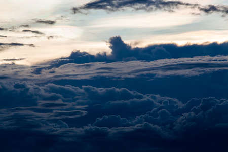 colorful dramatic sky with cloud at sunsetの写真素材