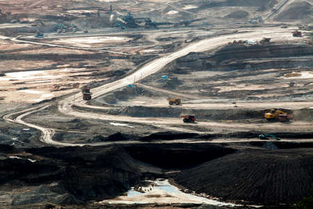 Part of a pit with big mining truck working