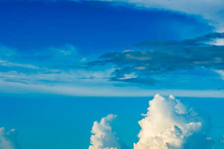 colorful dramatic sky with cloud at sunsetの写真素材