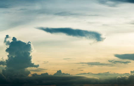 colorful dramatic sky with cloud at sunset.の写真素材