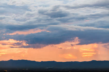 colorful dramatic sky with cloud at sunset.の写真素材