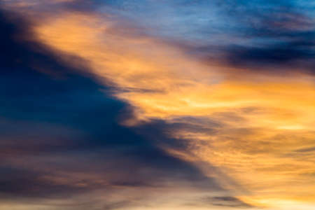 colorful dramatic sky with cloud at sunset.