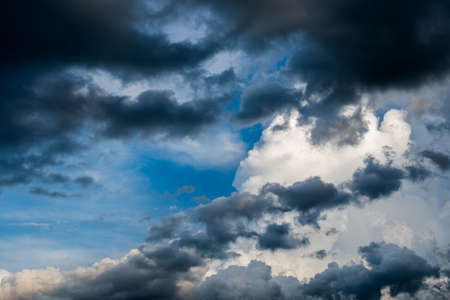 colorful dramatic sky with cloud at sunset.の写真素材