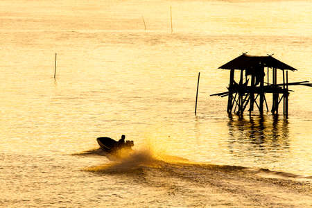 Silhouette of fishermenの写真素材