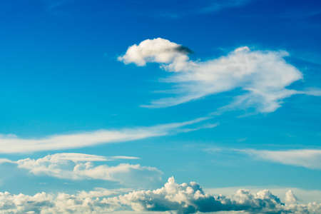 colorful dramatic sky with cloud at sunsetの写真素材