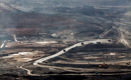 Part of a pit with big mining truck working