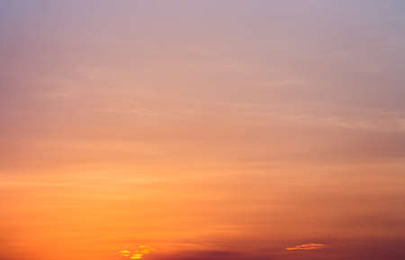 colorful dramatic sky with cloud at sunsetの写真素材