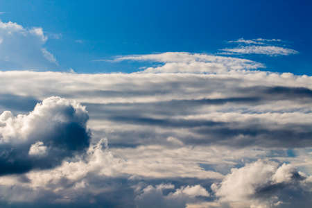 colorful dramatic sky with cloud at sunsetの写真素材