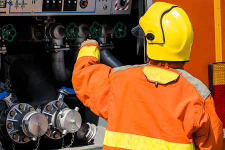 Fireman Fire fighter attackingの写真素材