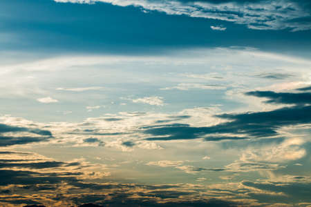 colorful dramatic sky with cloud at sunset.の写真素材