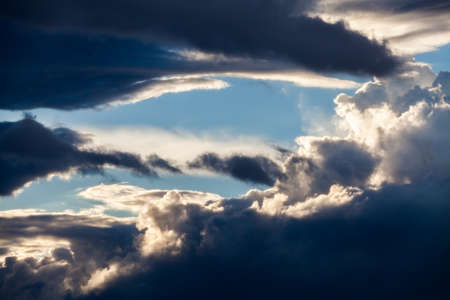 colorful dramatic sky with cloud at sunset.の写真素材