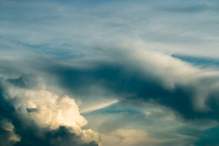 colorful dramatic sky with cloud at sunsetの写真素材