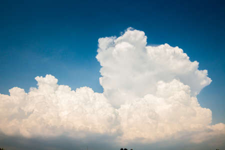 colorful dramatic sky with cloud at sunset.の写真素材