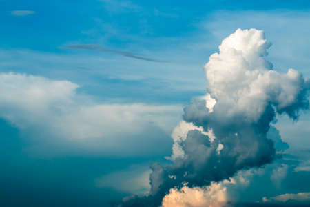 colorful dramatic sky with cloud at sunsetの写真素材