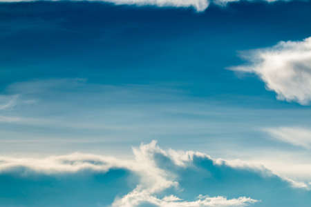 colorful dramatic sky with cloud at sunsetの写真素材