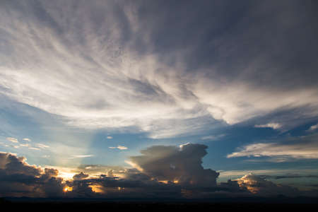 colorful dramatic sky with cloud at sunset.の写真素材