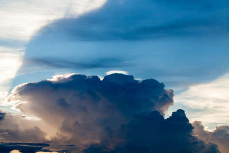 colorful dramatic sky with cloud at sunset.
