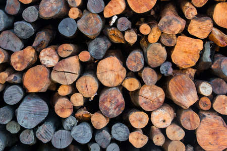 Natural wooden background - closeup of chopped firewood.の写真素材