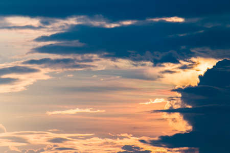 colorful dramatic sky with cloud at sunset.