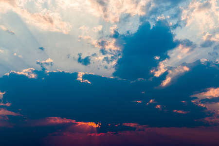 colorful dramatic sky with cloud at sunset.の写真素材