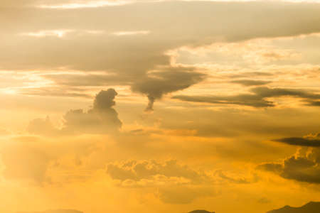 colorful dramatic sky with cloud at sunset.