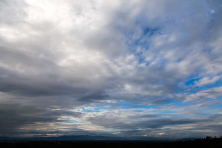 colorful dramatic sky with cloud at sunset.