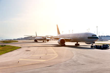 Airport with many airplanes at beautiful sunsetのeditorial素材