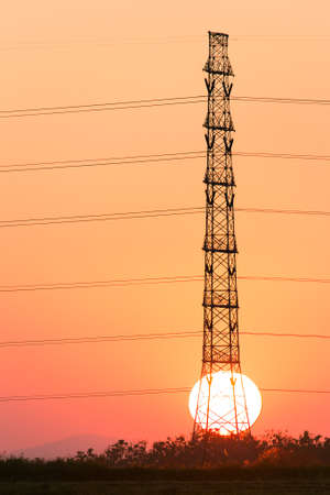 silhouette of high voltage electrical pole structureの写真素材