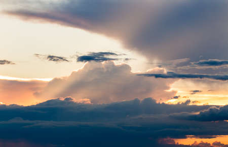 colorful dramatic sky with cloud at sunset.