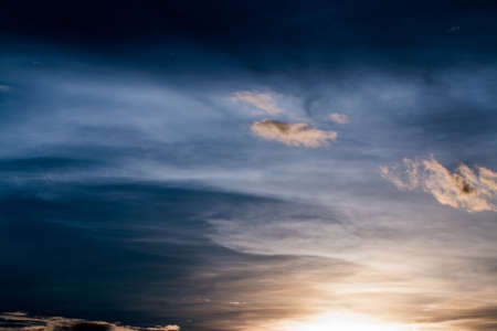 colorful dramatic sky with cloud at sunset.