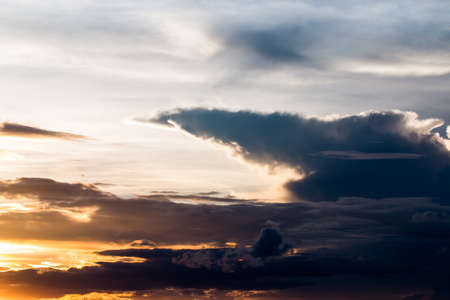 colorful dramatic sky with cloud at sunset.の写真素材