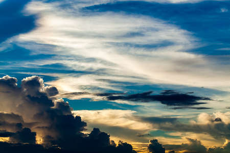 colorful dramatic sky with cloud at sunset.の写真素材