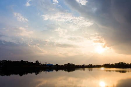 colorful dramatic sky with cloud at sunset.の写真素材