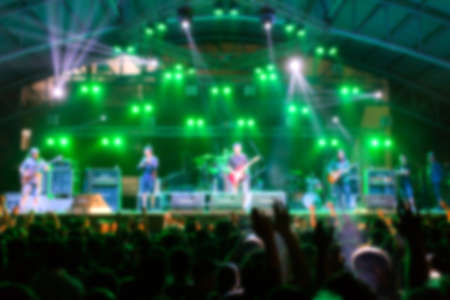 blurry image background of many audience concert in big rock concert.の写真素材