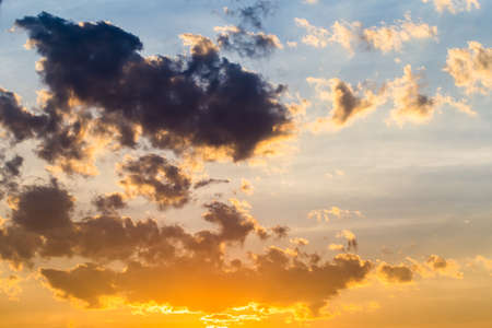 colorful dramatic sky with cloud at sunset.の写真素材