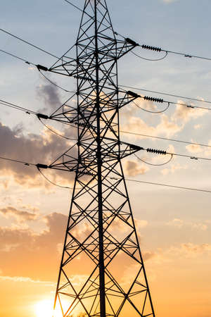silhouette of high voltage electrical pole structureの写真素材