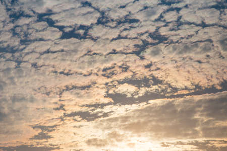 colorful dramatic sky with cloud at sunset.