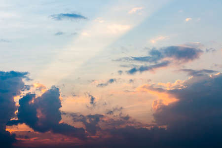 colorful dramatic sky with cloud at sunset.の写真素材