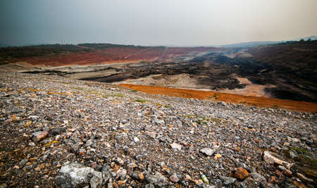 Part of a pit with big mining truck working