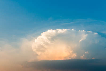 colorful dramatic sky with cloud at sunset.の写真素材