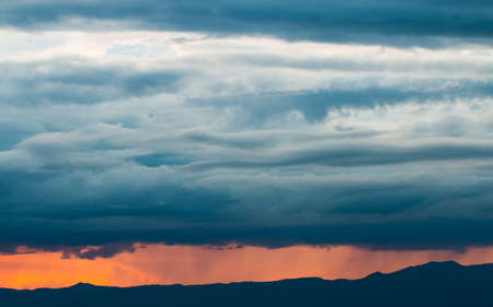 colorful dramatic sky with cloud at sunset.の写真素材